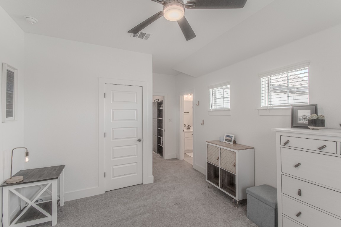 308 Millbend Road Georgetown, TX 78633 - Photo 23 of 40 a room with a cabinets and a dresser
