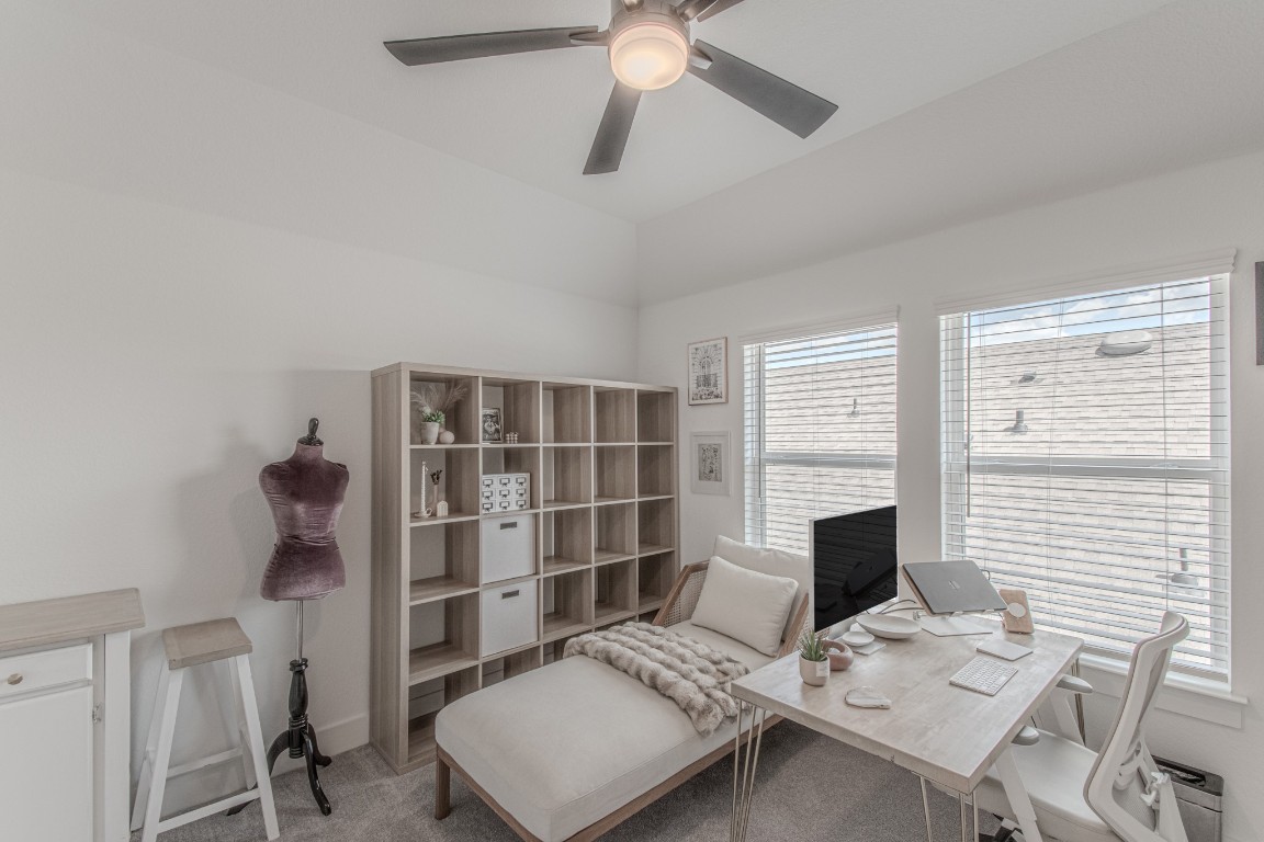 308 Millbend Road Georgetown, TX 78633 - Photo 26 of 40 a view of a workspace with furniture and a window