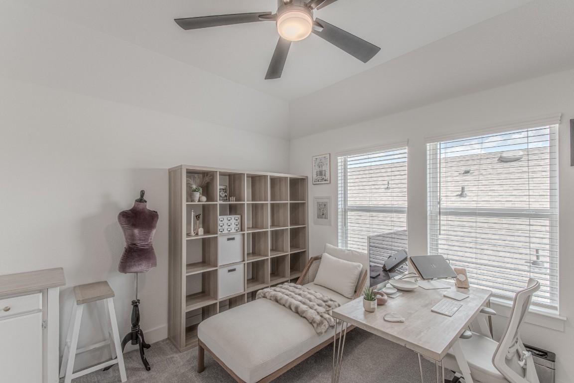 308 Millbend Road Georgetown, TX 78633 - Photo 27 of 40 a view of a workspace with furniture and a window