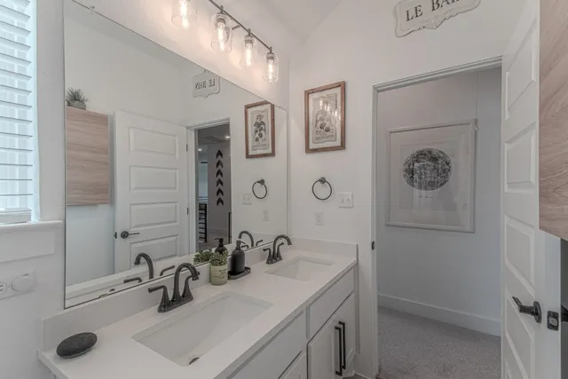 a view of a porch with furniture and a yard