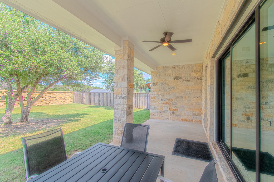 308 Millbend Road Georgetown, TX 78633 - Photo 33 of 40 a view of a porch with furniture and a yard