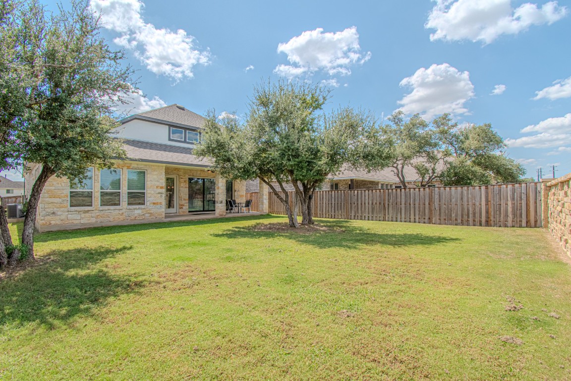 308 Millbend Road Georgetown, TX 78633 - Photo 36 of 40 a view of a house with a yard