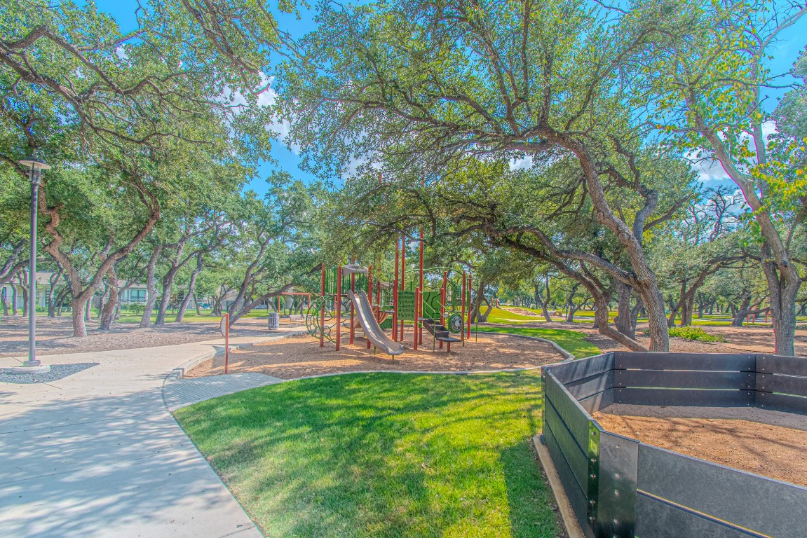 308 Millbend Road Georgetown, TX 78633 - Photo 38 of 40 a view of outdoor space with garden and trees