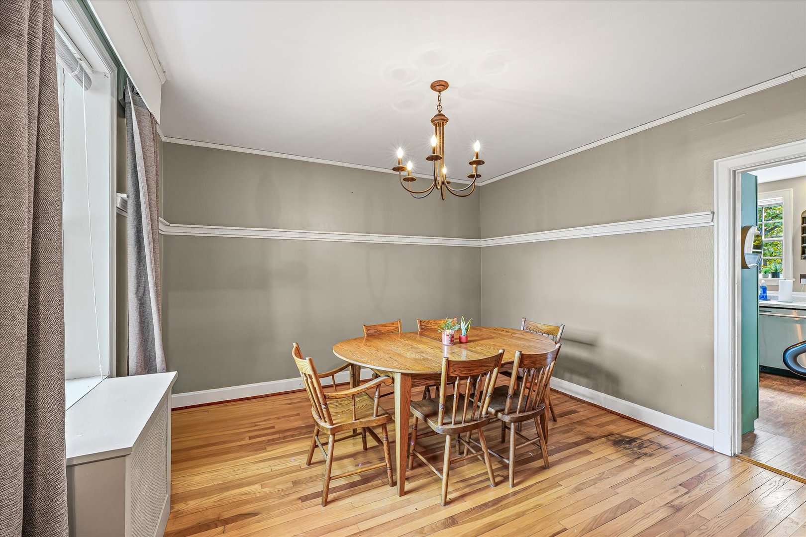 824 Arends Boulevard Rantoul, IL 61866 - Photo 12 of 38 a view of a dining room with furniture and wooden floor