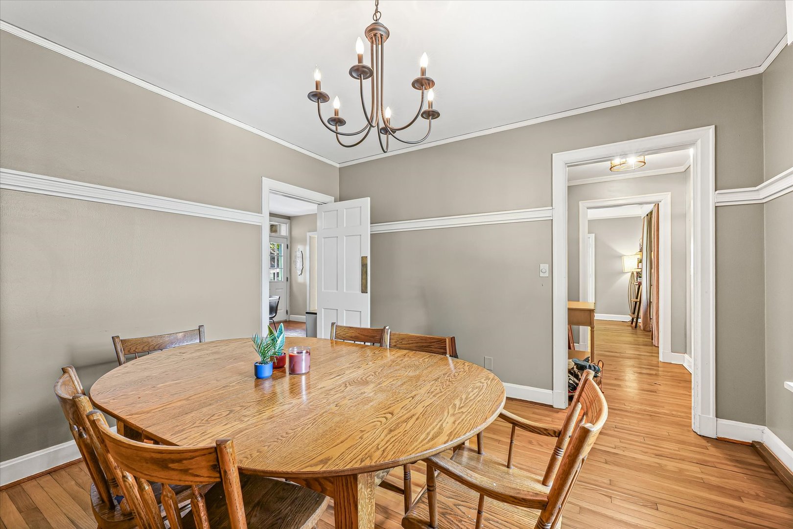 824 Arends Boulevard Rantoul, IL 61866 - Photo 13 of 38 a view of a dining room with furniture and wooden floor