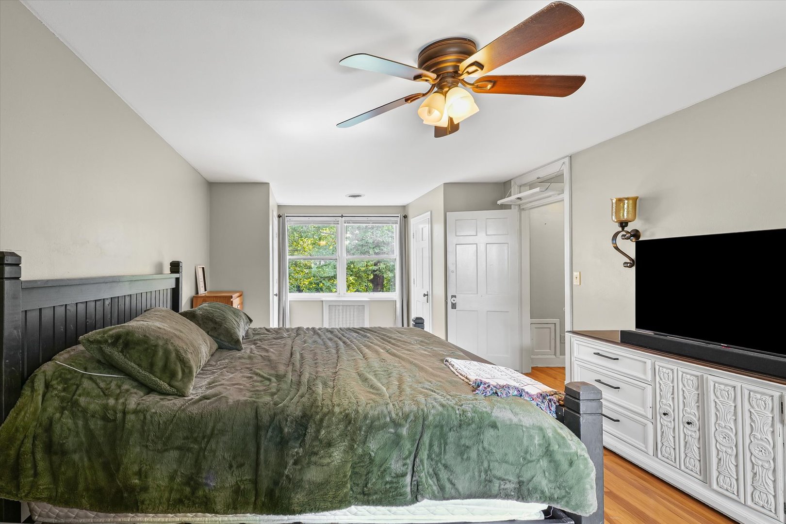 824 Arends Boulevard Rantoul, IL 61866 - Photo 25 of 38 a living room with furniture and a flat screen tv