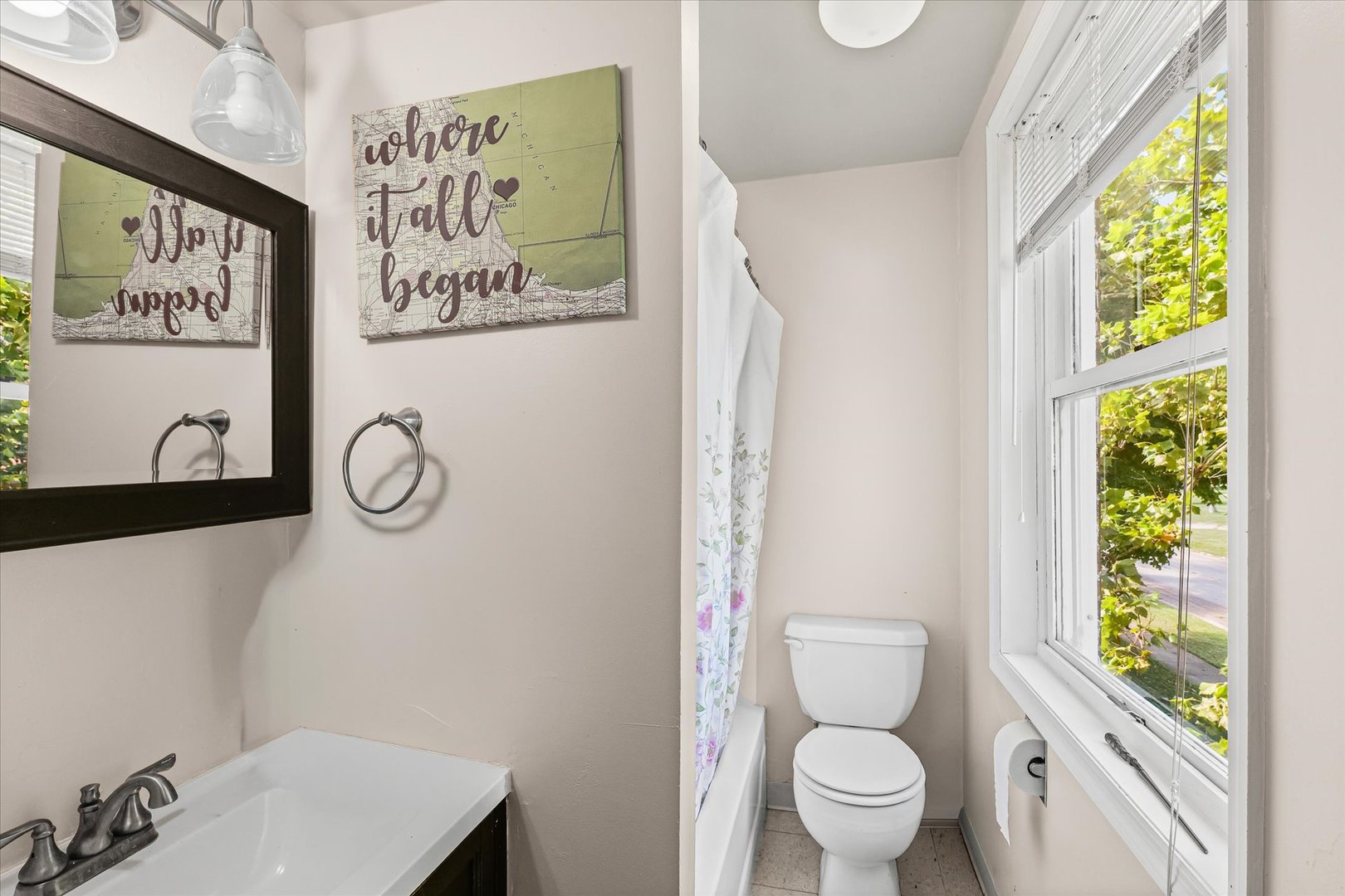 824 Arends Boulevard Rantoul, IL 61866 - Photo 26 of 38 a white toilet sitting next to a bathroom sink