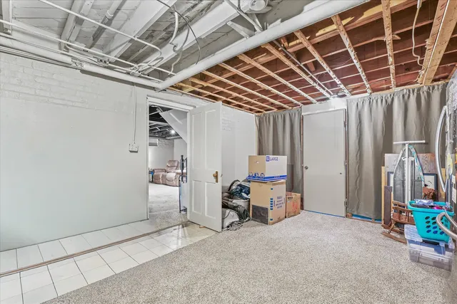 a view of storage and utility room