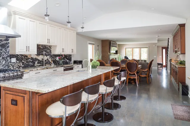 a view of dining table and chairs