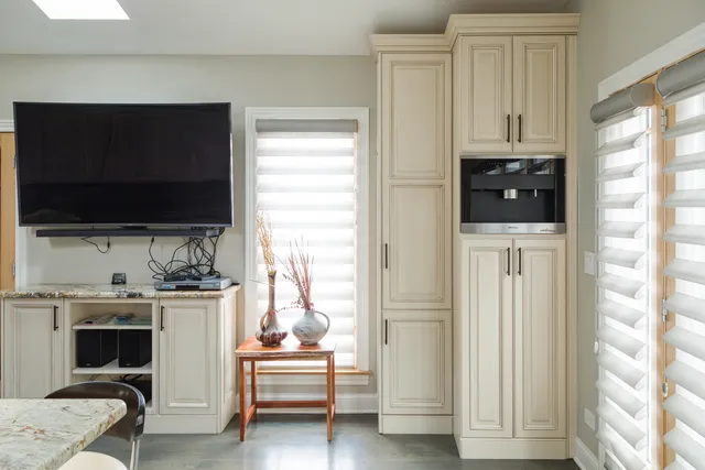 a room with a table and chairs