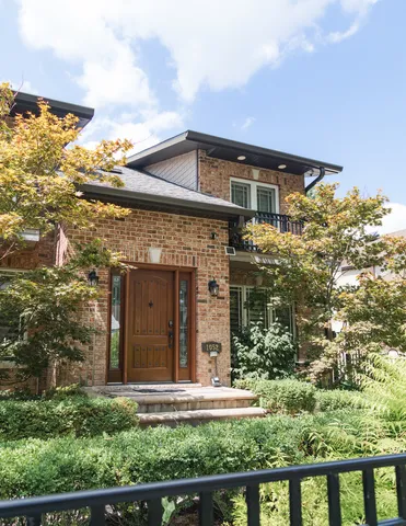 front view of a house with a small yard