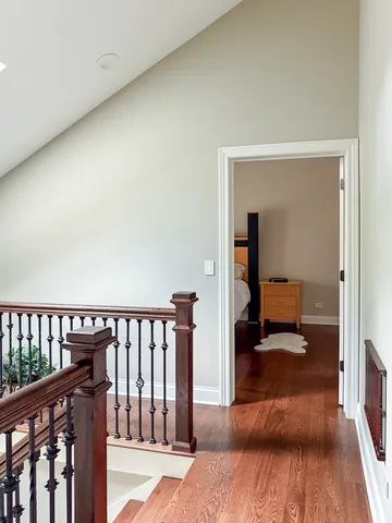 a spacious bedroom with a bed and a couch