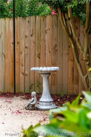 a garden view with a sitting space