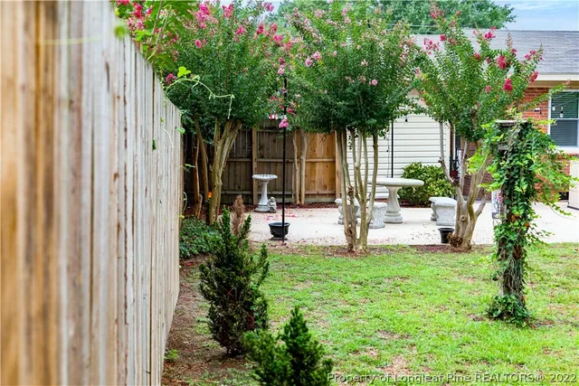 a house view with a garden space