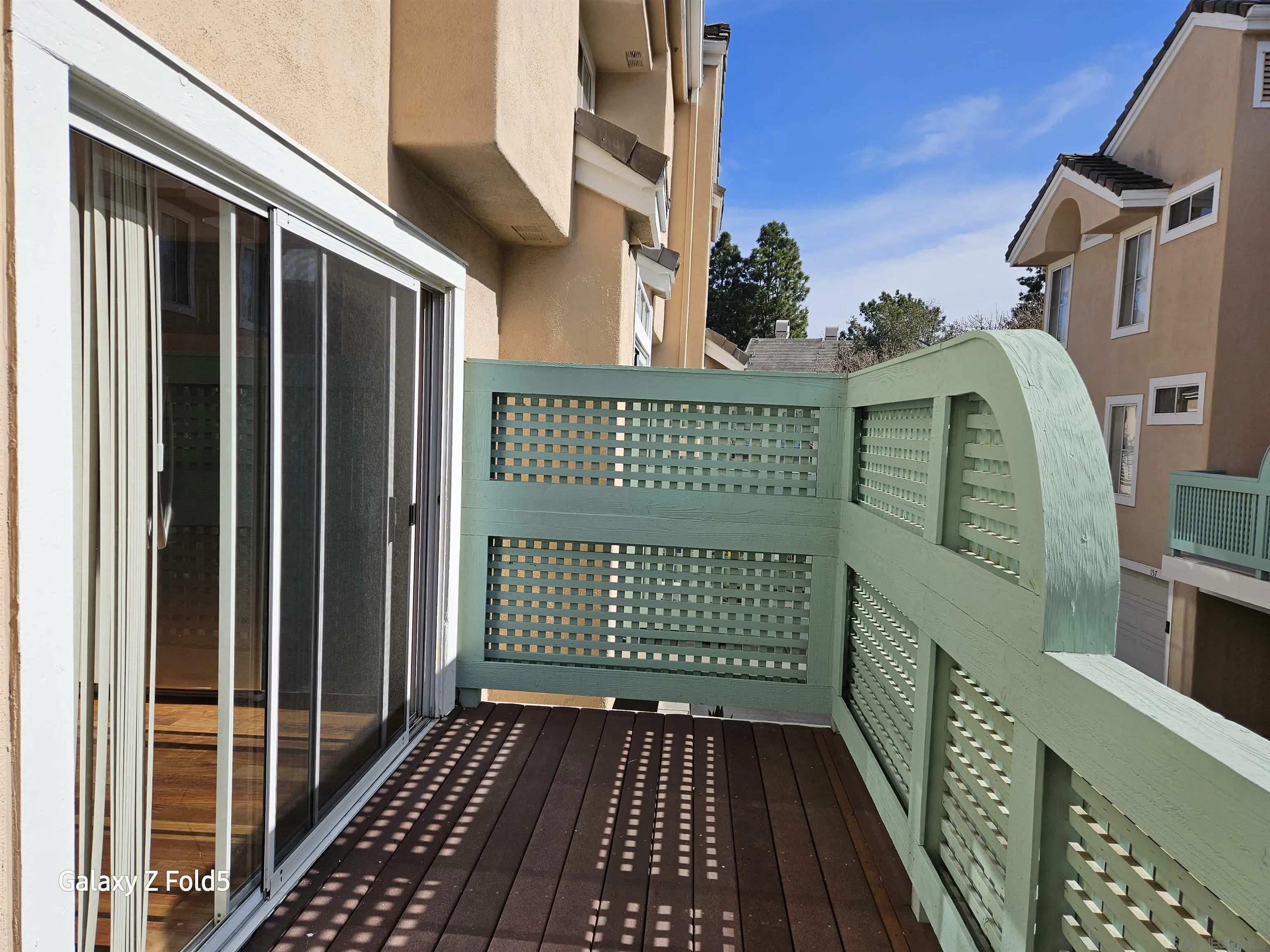 12980 Carmel Creek Road San Diego, CA 92130 - Photo 6 of 13 a view of a balcony with wooden floor