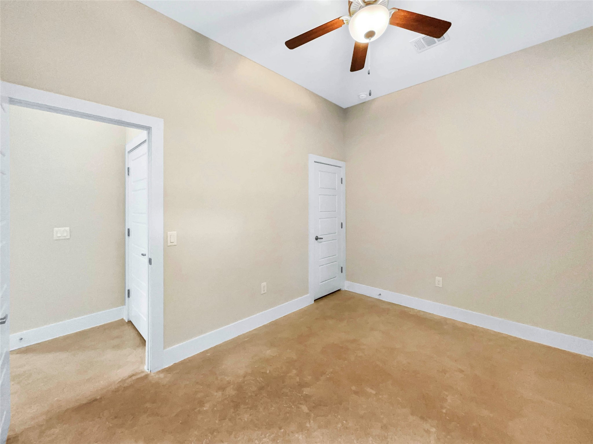 6213 Felix Avenue, Unit B Austin, TX 78741 - Photo 10 of 21 Spare room featuring baseboards and a ceiling fan