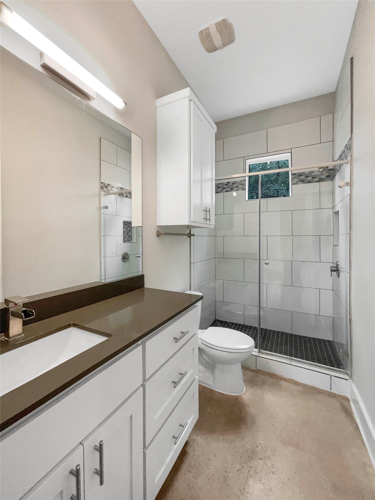 6213 Felix Avenue, Unit B Austin, TX 78741 - Photo 13 of 21 Full bath featuring vanity, a shower stall, and concrete flooring