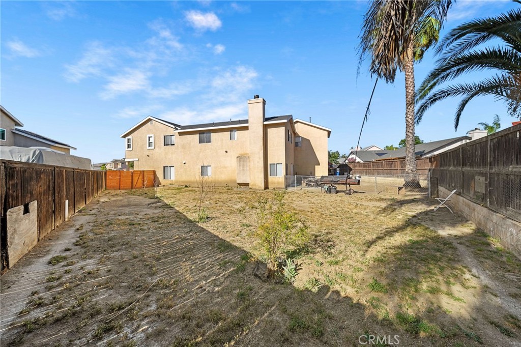 1494 Rabbit Peak Way Hemet, CA 92545 - Photo 38 of 45 a view of a backyard of the house