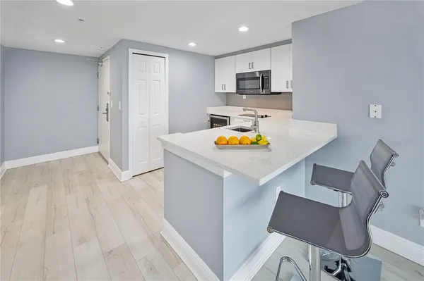 a view of kitchen and microwave