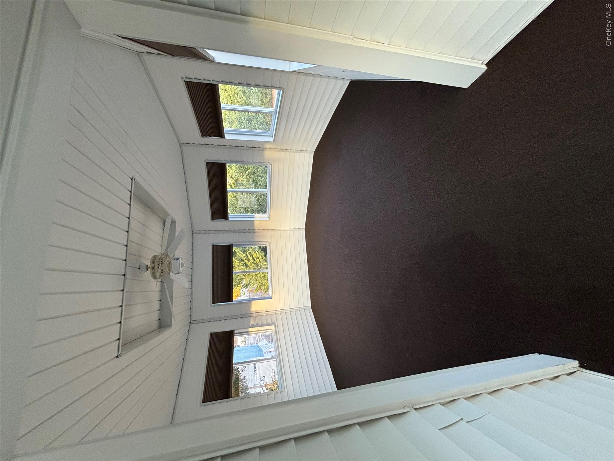 445 North Country Road St. James, NY 11780 - Photo 13 of 13 a view of an empty room with a window