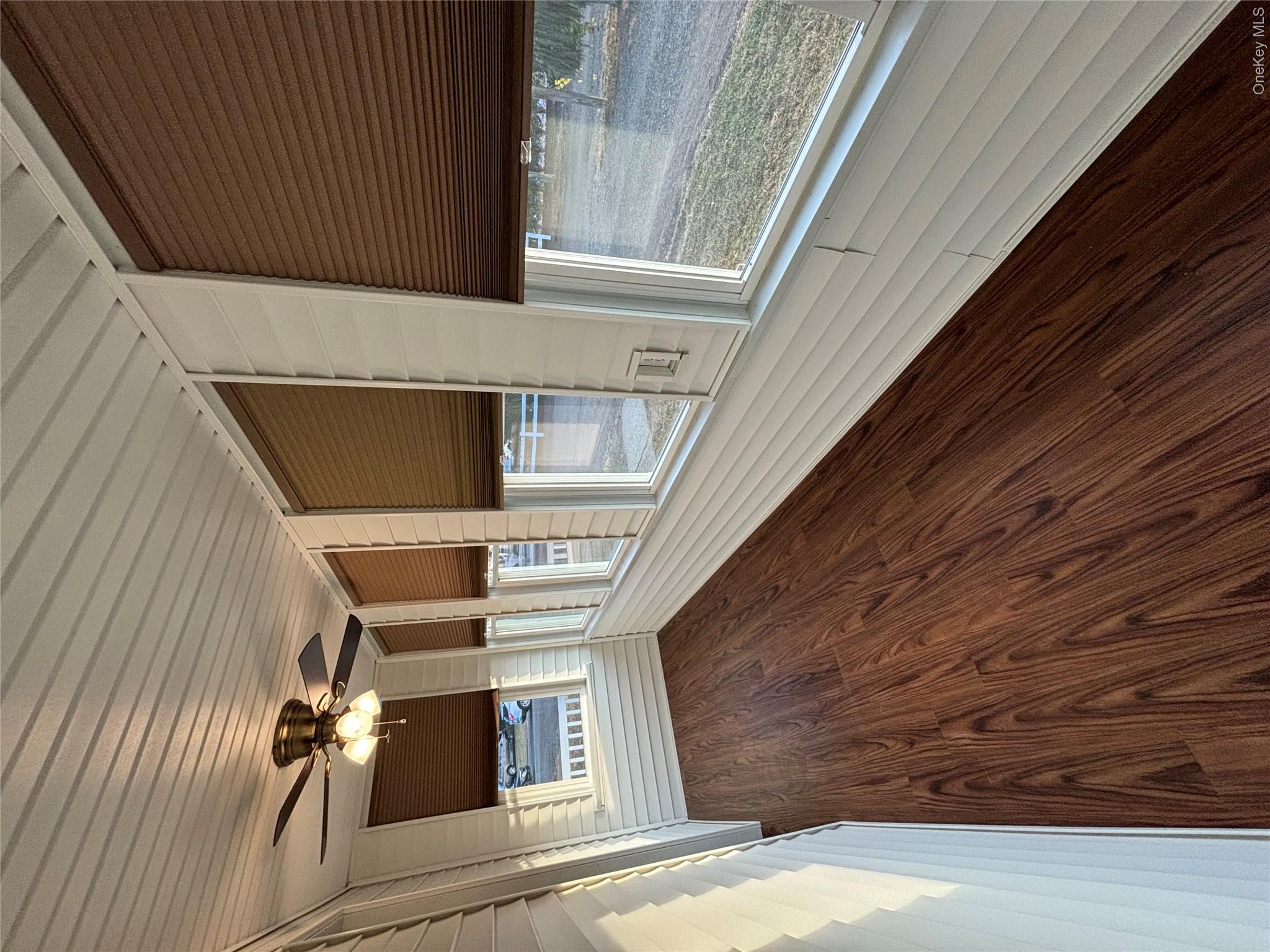 445 North Country Road St. James, NY 11780 - Photo 8 of 13 a view of a balcony with furniture
