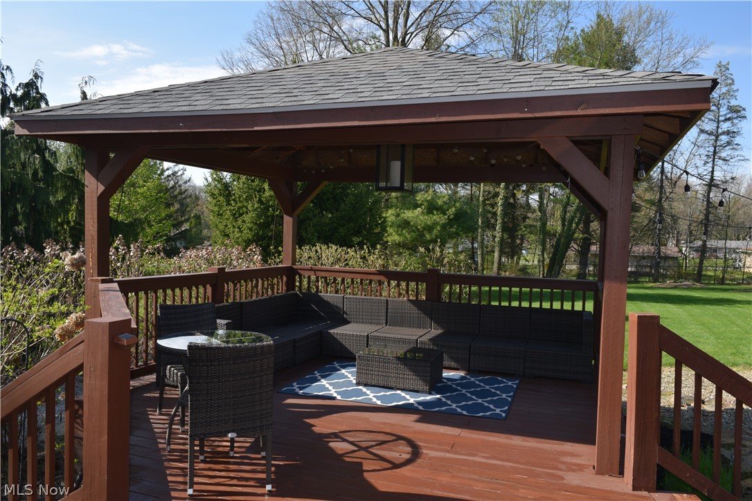 3285 Hemphill Road Barberton, OH 44203 - Photo 9 of 50 Gazebo wooden terrace with an outdoor hangout area, a lawn