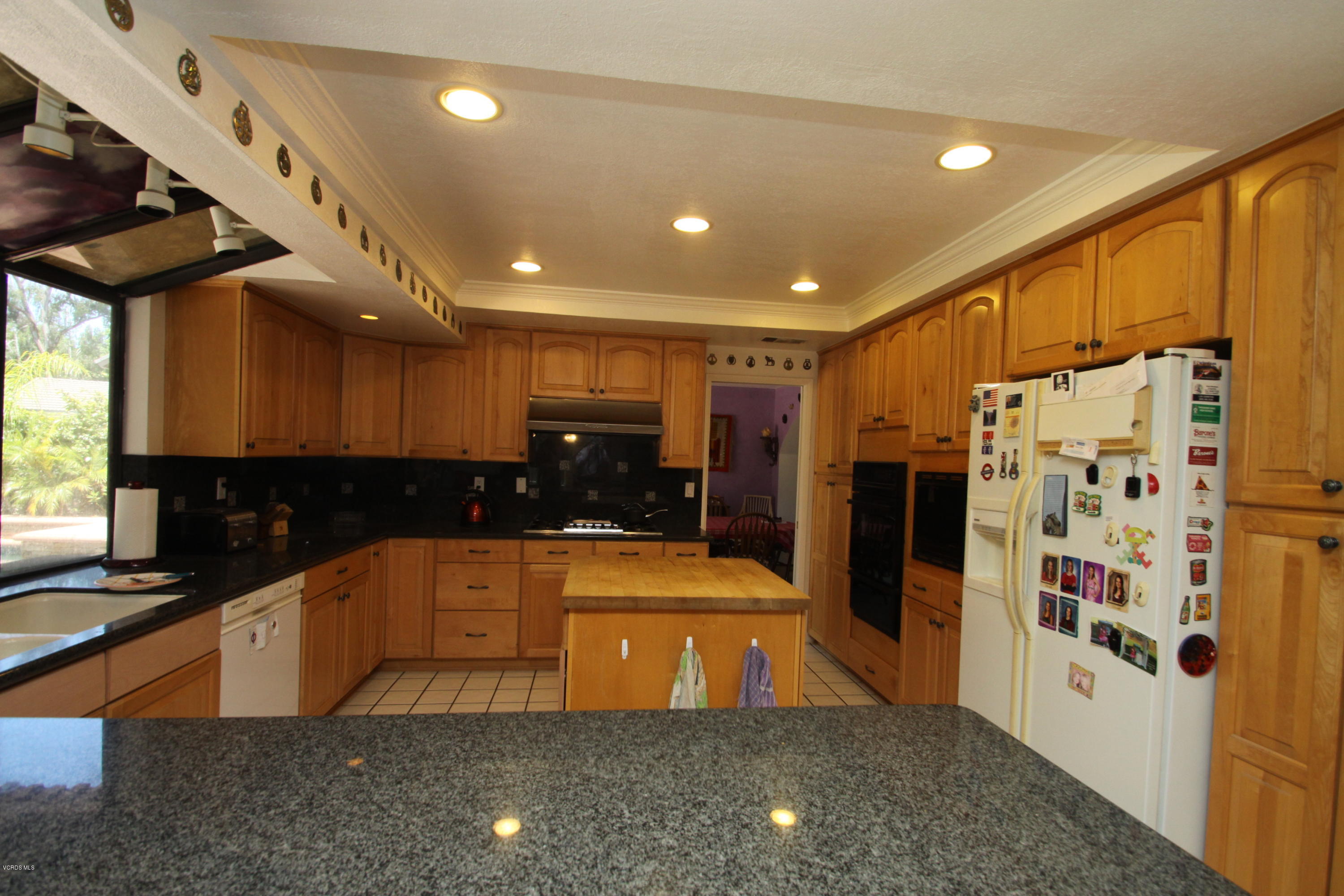 2136 McCrea Road Thousand Oaks, CA 91362 - Photo 2 of 26 a large kitchen with stainless steel appliances a refrigerator a oven a sink and a cabinets