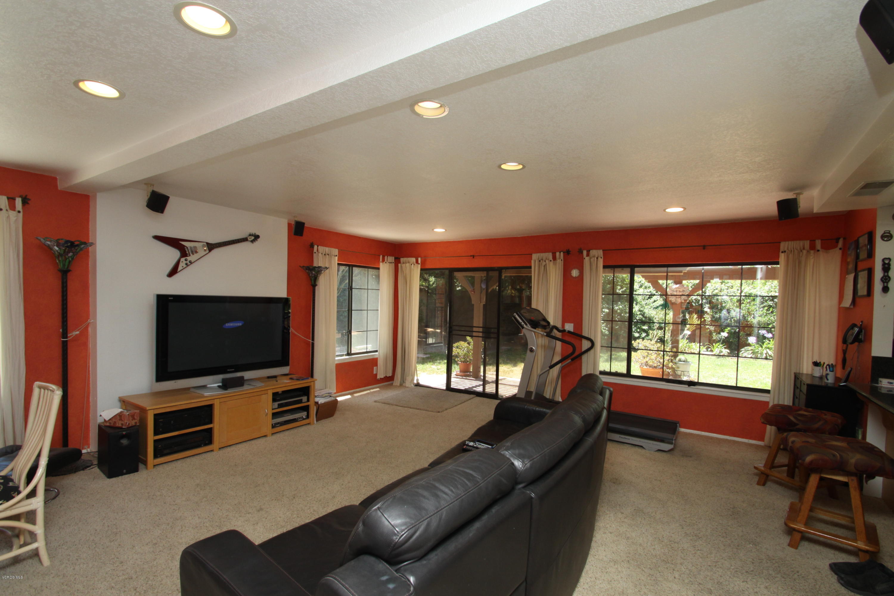 2136 McCrea Road Thousand Oaks, CA 91362 - Photo 12 of 26 a living room with furniture and a flat screen tv