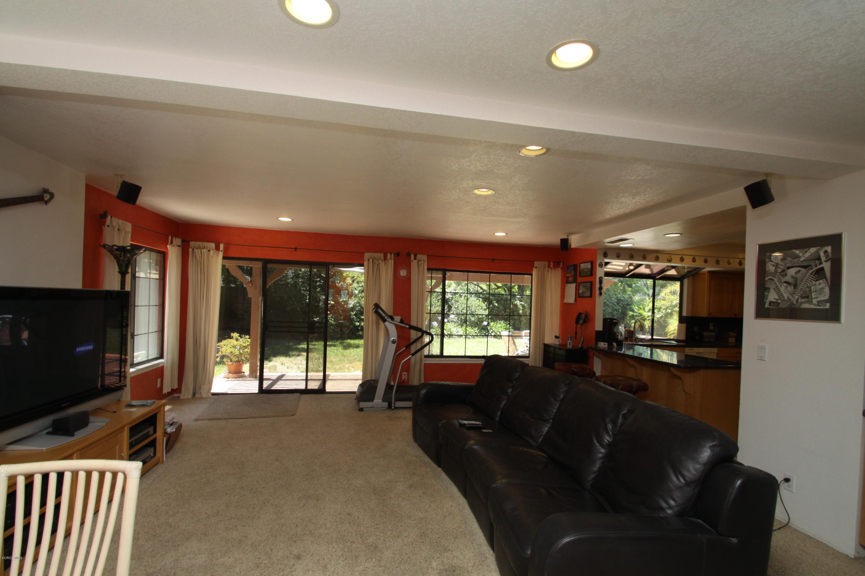 2136 McCrea Road Thousand Oaks, CA 91362 - Photo 13 of 26 a living room with furniture and a flat screen tv