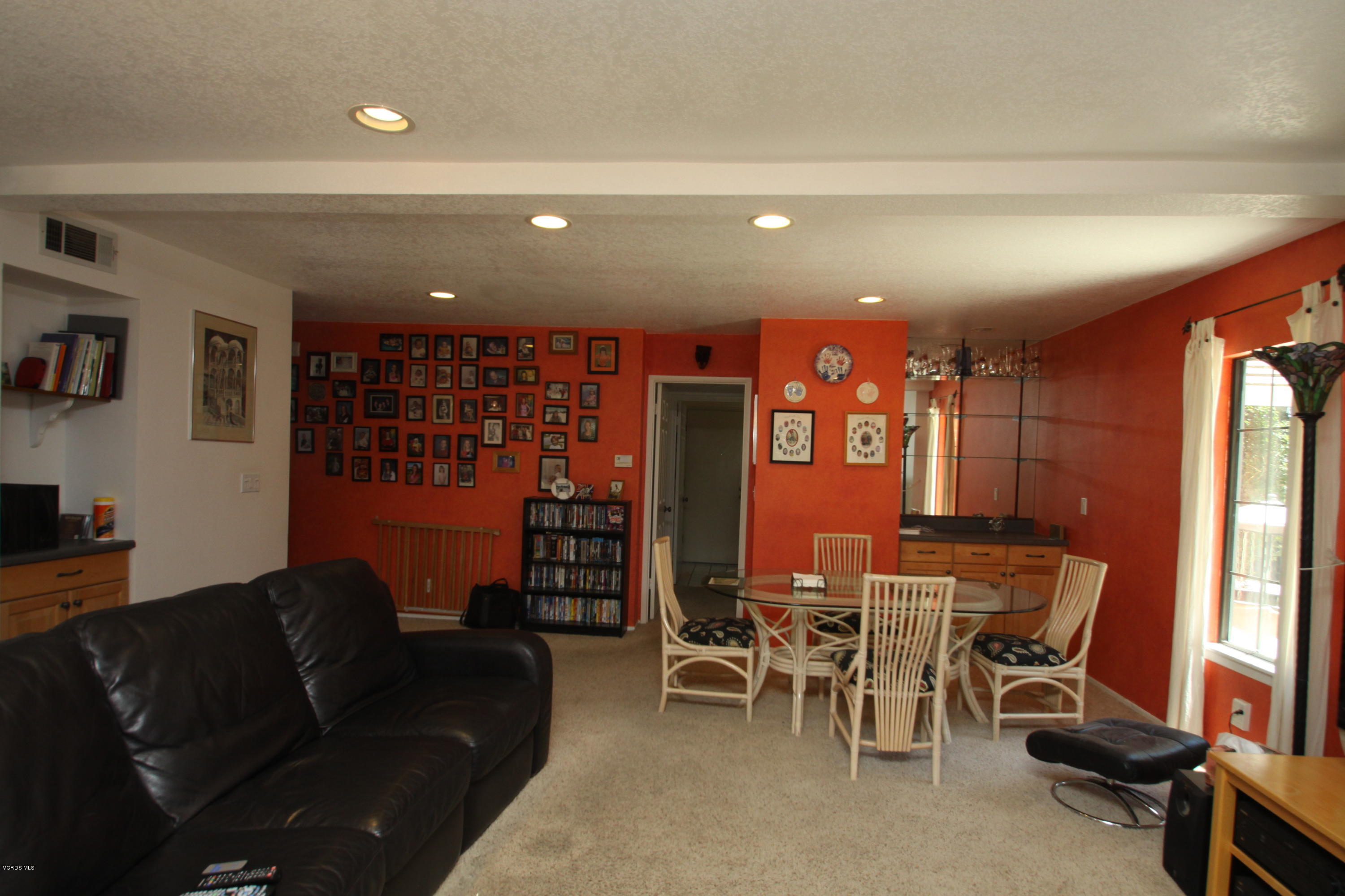 2136 McCrea Road Thousand Oaks, CA 91362 - Photo 15 of 26 a projector room with furniture and a flat screen tv