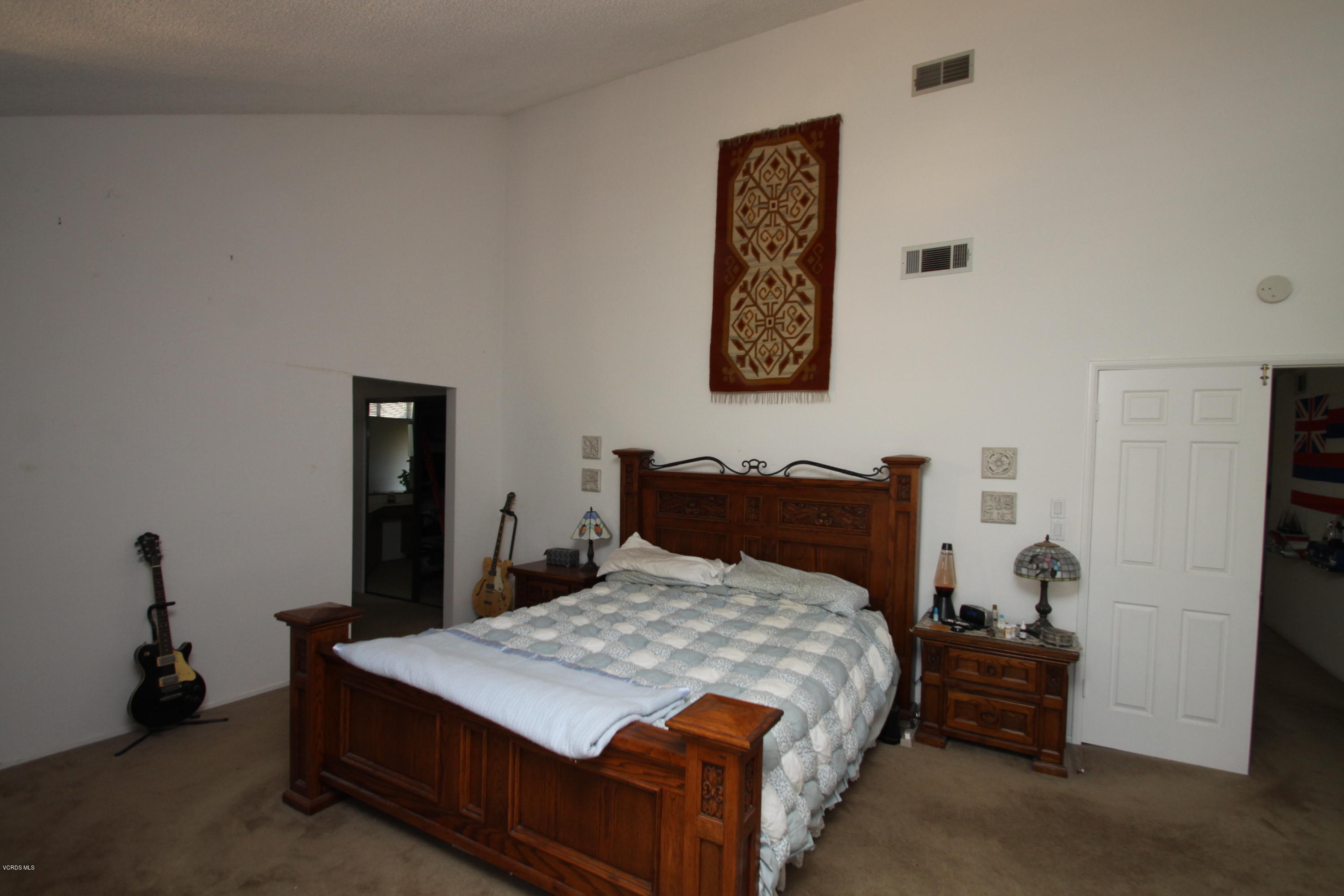 2136 McCrea Road Thousand Oaks, CA 91362 - Photo 16 of 26 a bedroom with a bed and a dresser