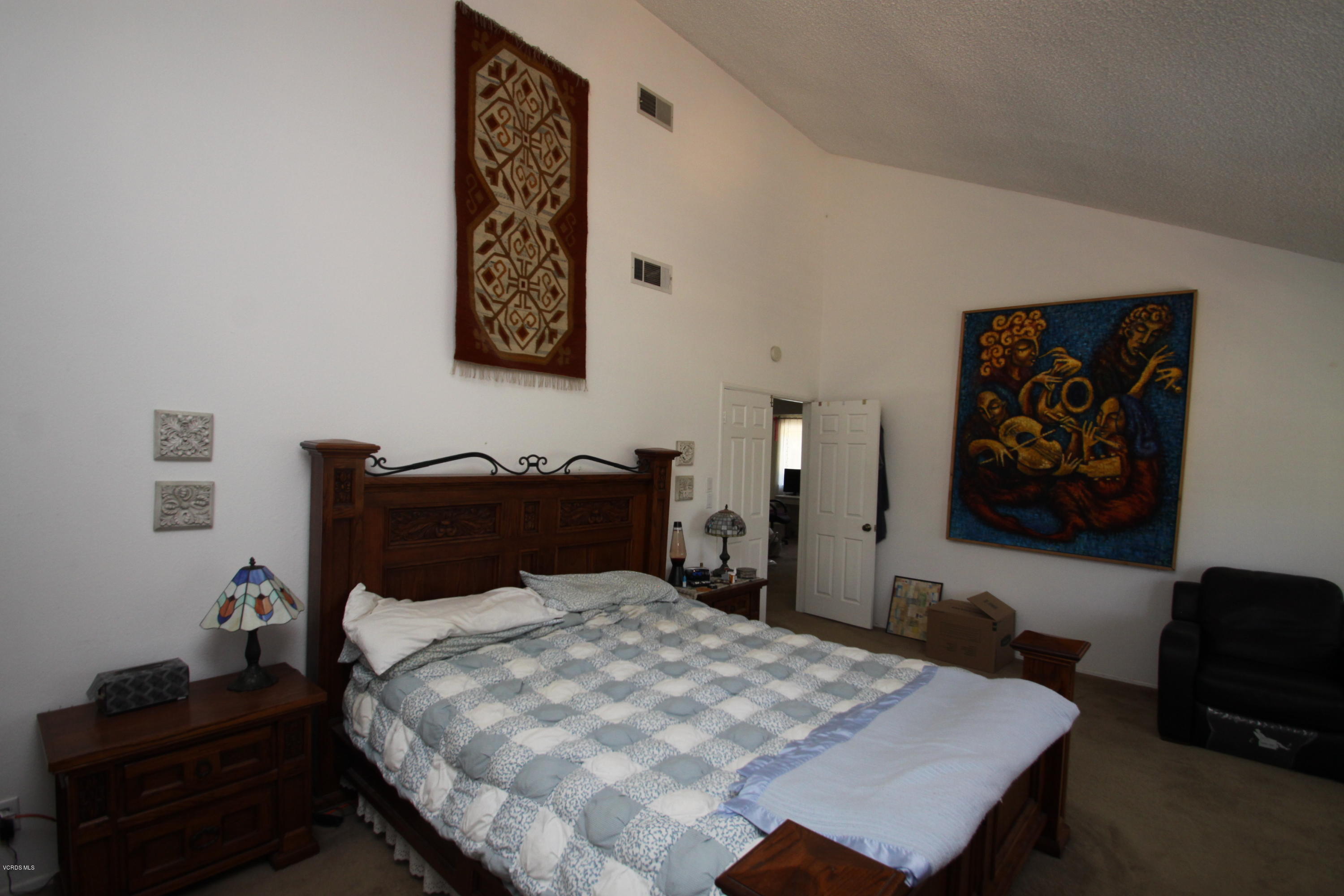 2136 McCrea Road Thousand Oaks, CA 91362 - Photo 18 of 26 a bedroom with a bed and furniture