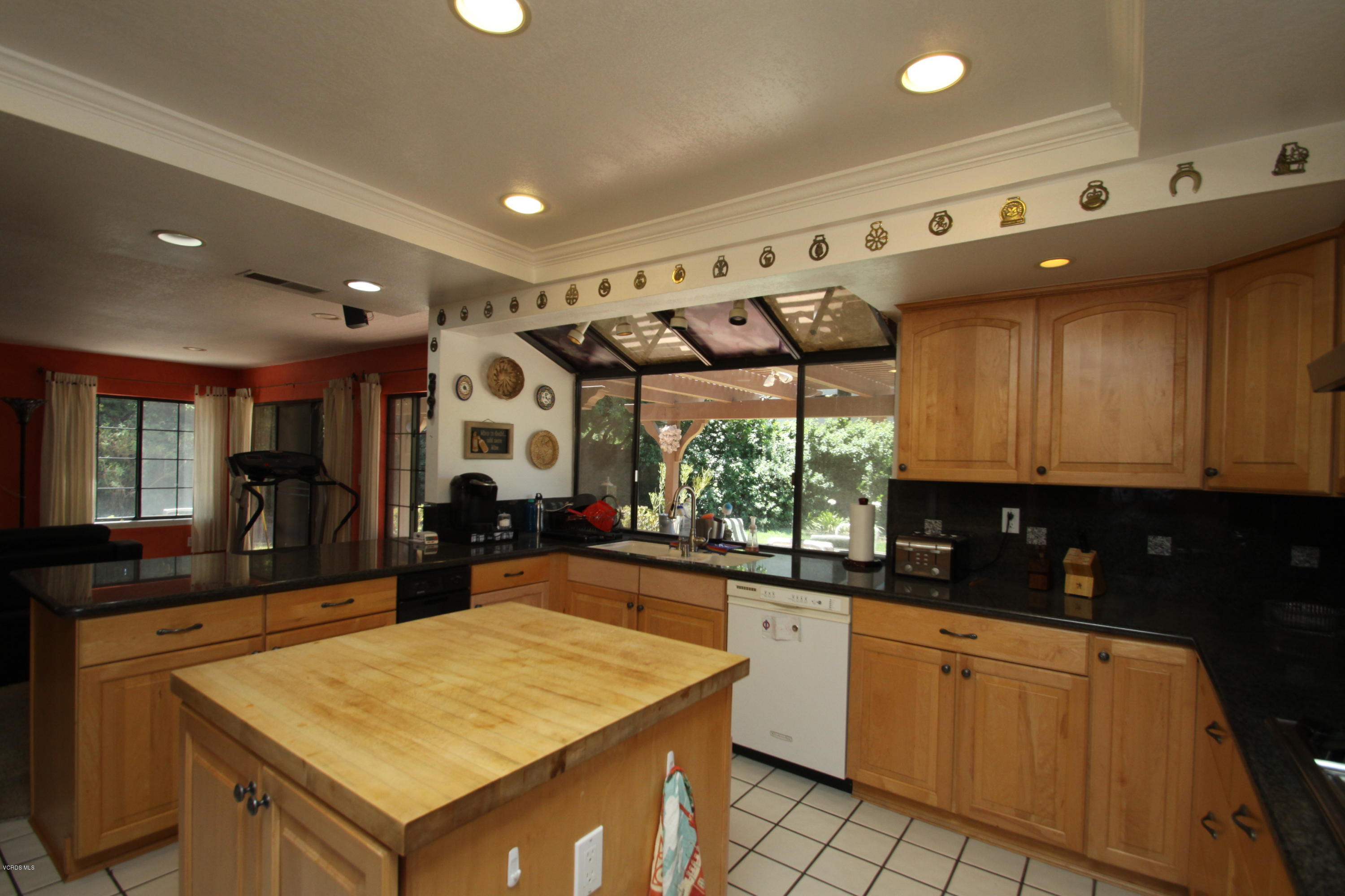 2136 McCrea Road Thousand Oaks, CA 91362 - Photo 3 of 26 a kitchen with a sink a counter top space and stainless steel appliances