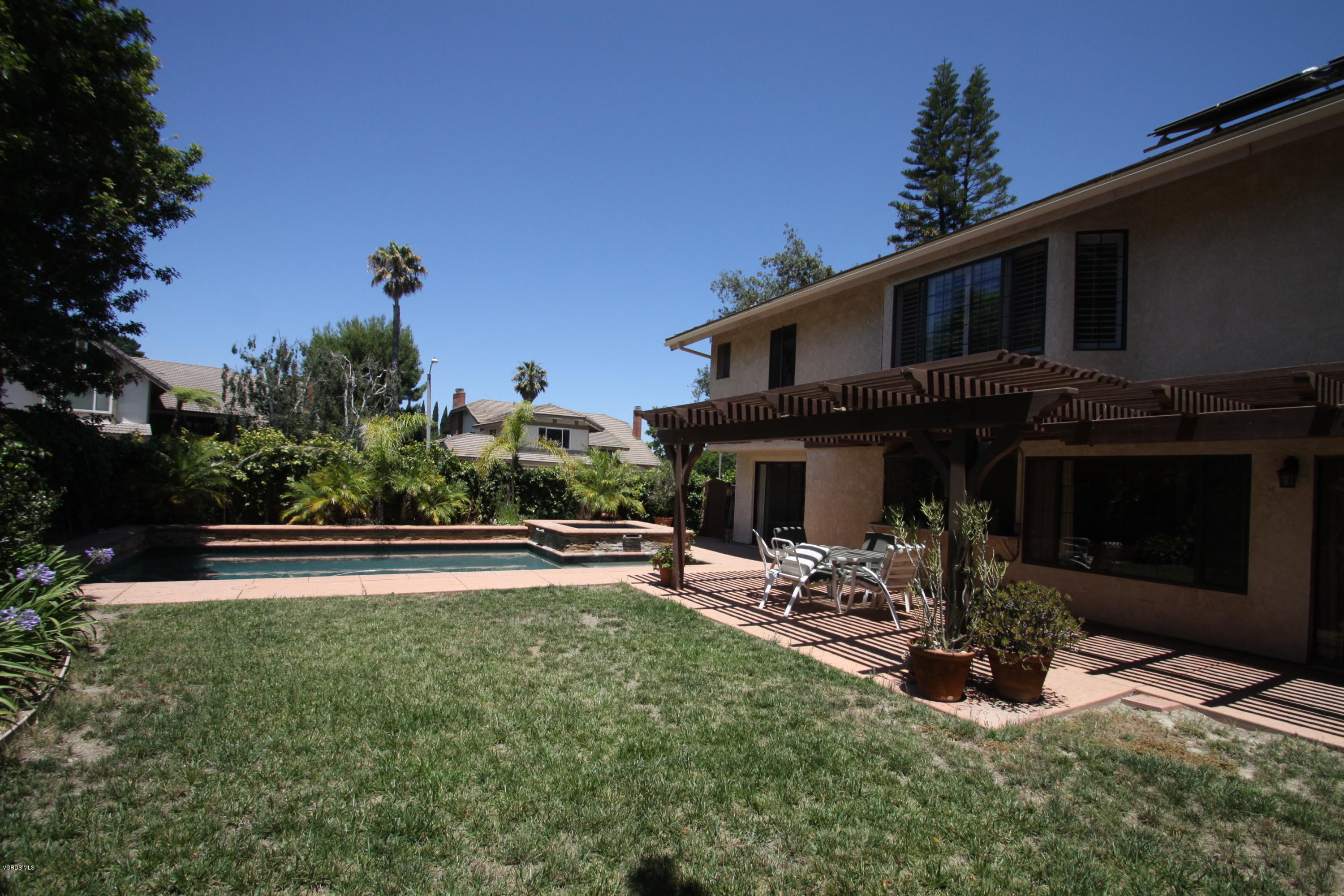 2136 McCrea Road Thousand Oaks, CA 91362 - Photo 22 of 26 a view of a house with backyard porch and sitting area