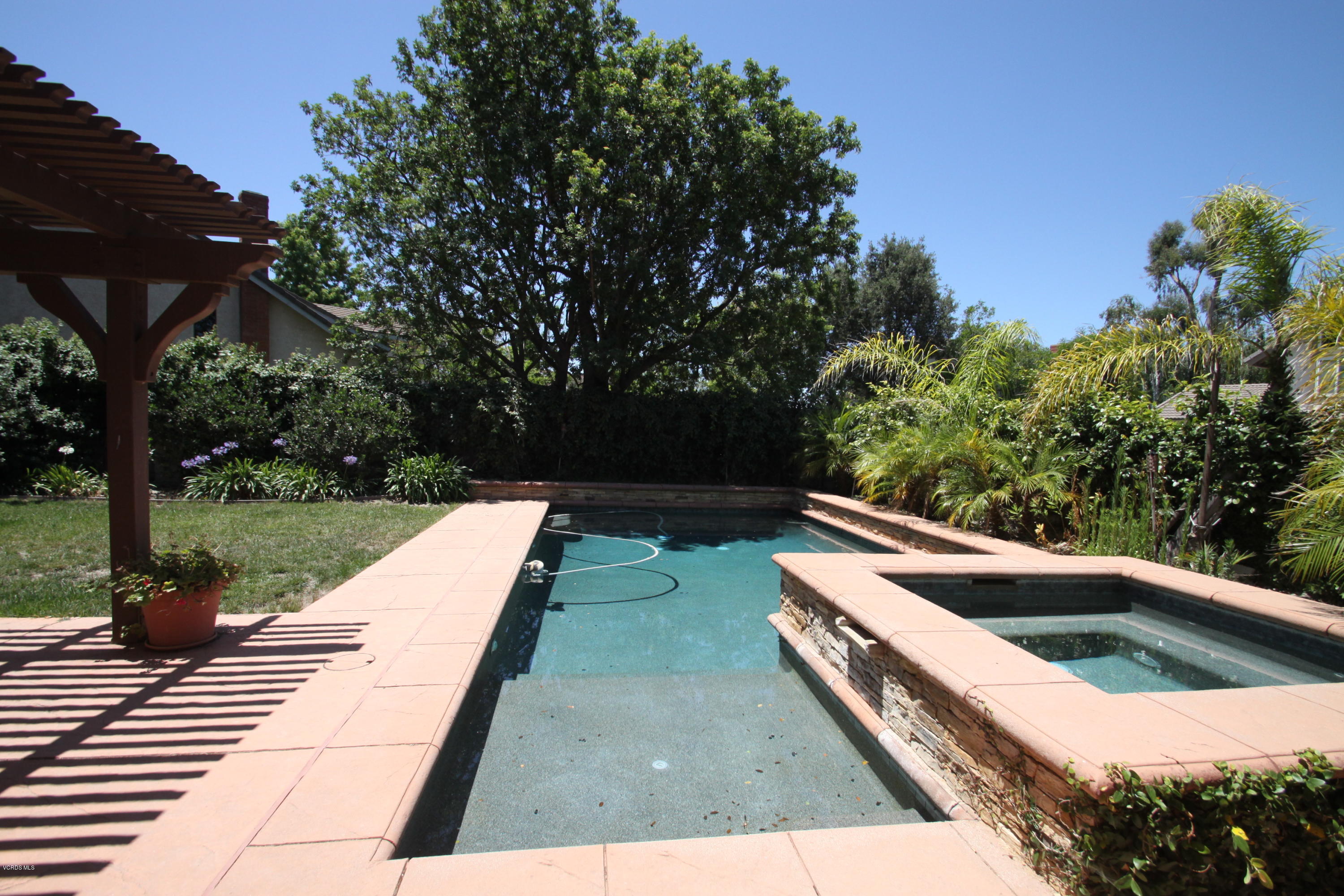 2136 McCrea Road Thousand Oaks, CA 91362 - Photo 23 of 26 a view of a swimming pool with a patio
