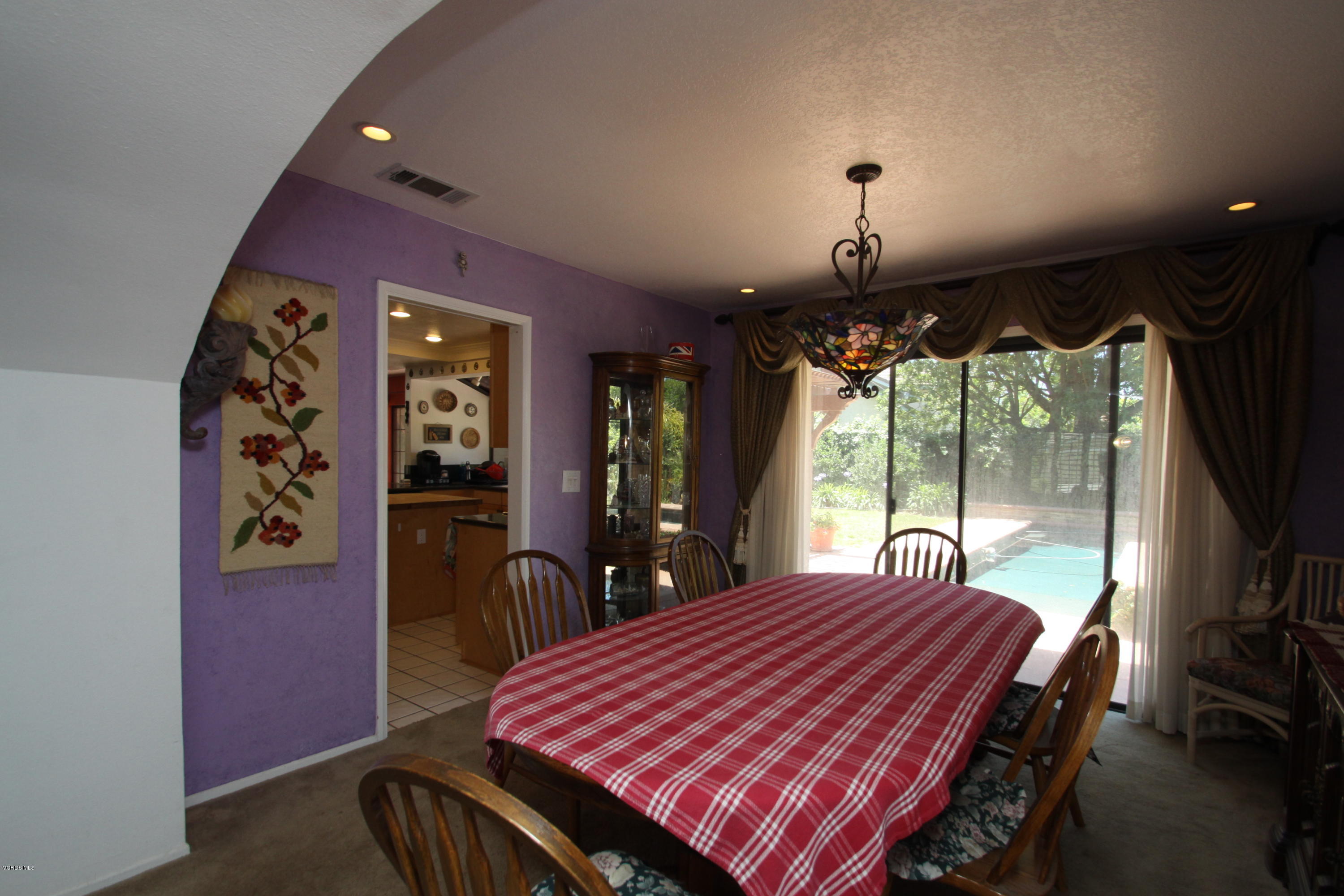 2136 McCrea Road Thousand Oaks, CA 91362 - Photo 8 of 26 a bedroom with a bed dresser and a large window