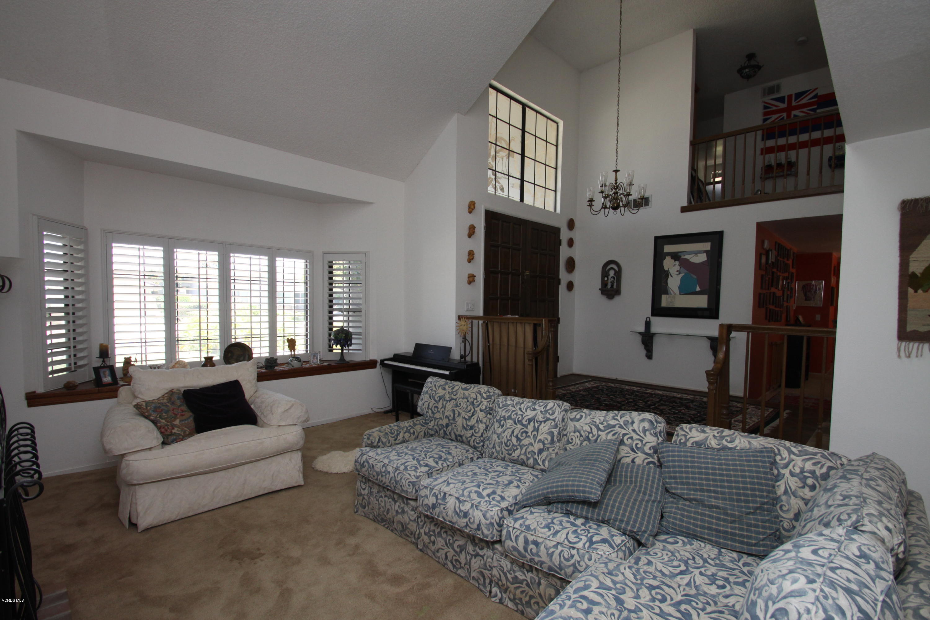 2136 McCrea Road Thousand Oaks, CA 91362 - Photo 9 of 26 a living room with furniture and a flat screen tv