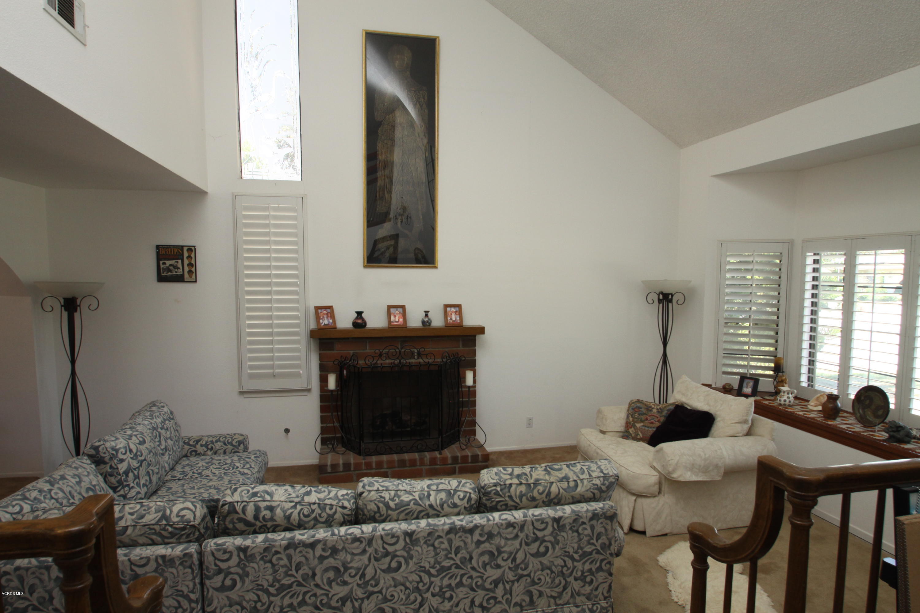 2136 McCrea Road Thousand Oaks, CA 91362 - Photo 10 of 26 a living room with furniture and a fireplace