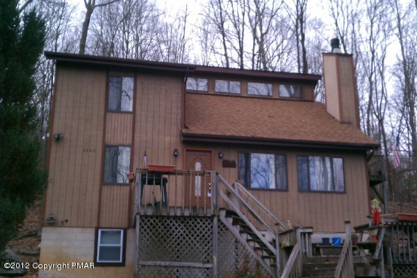 2382 Decker Road Bushkill, PA 18324 - Photo 1 of 9 a front view of a house with balcony