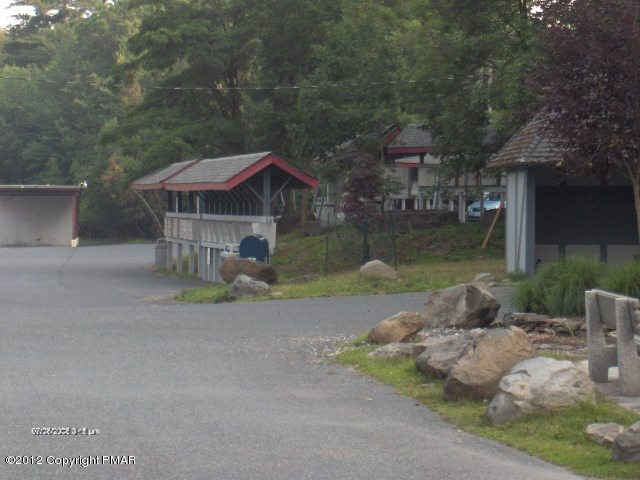 2382 Decker Road Bushkill, PA 18324 - Photo 6 of 9 a view of a house with a yard and sitting area