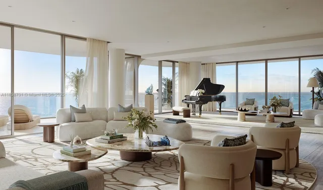 a living room with furniture and a floor to ceiling window