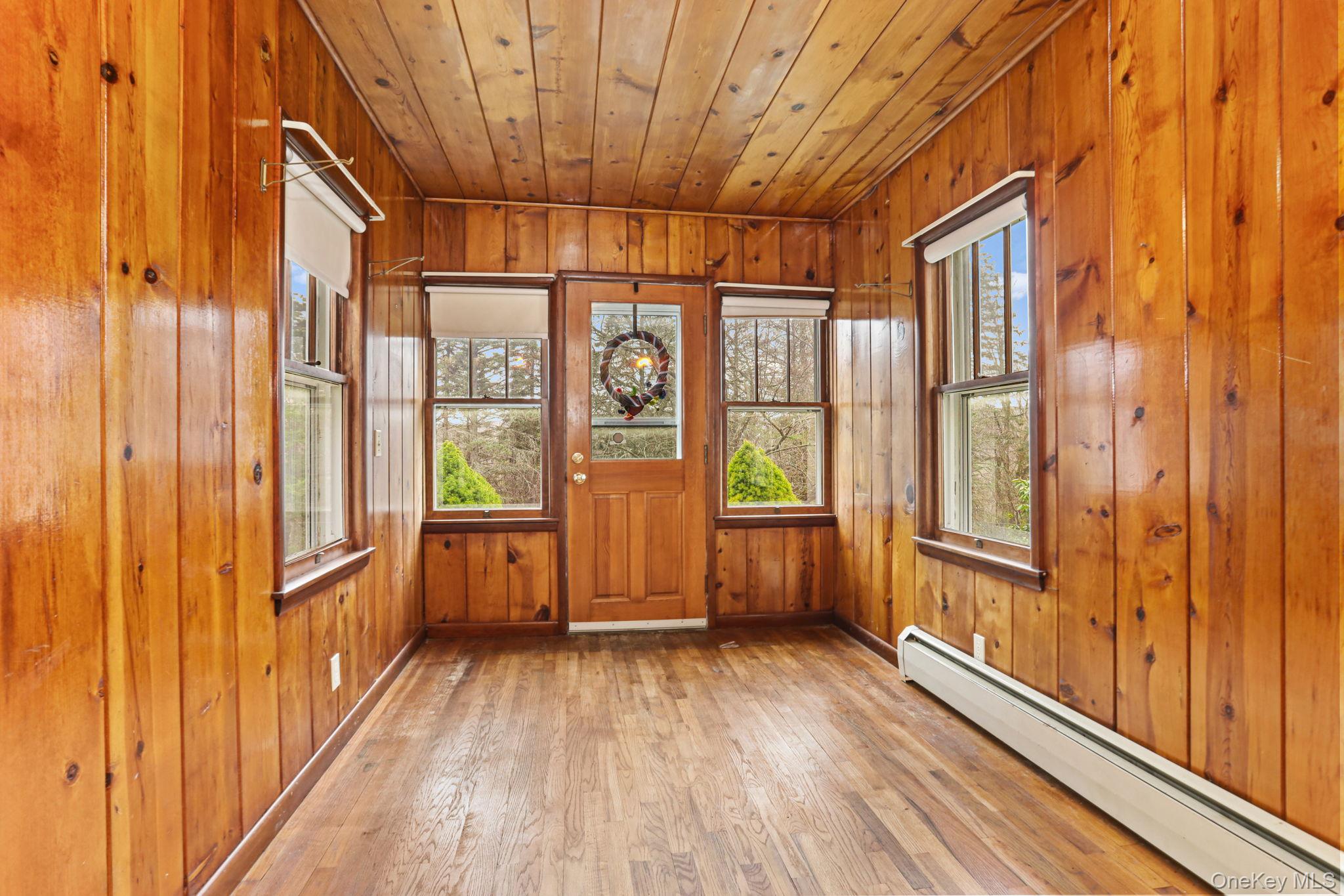 770 Gahbauer Road Hudson, NY 12534 - Photo 3 of 39 a view of an entryway with wooden floor and door