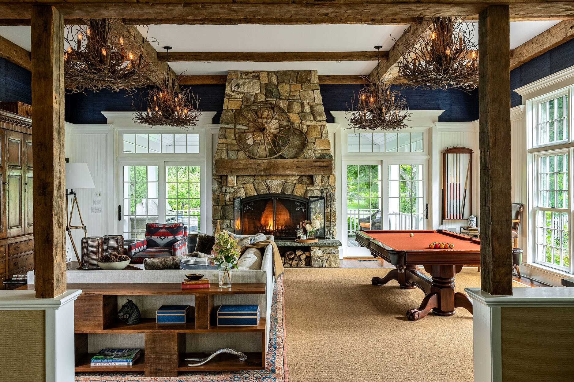 140 Sunset Trail Clinton, NY 12514 - Photo 12 of 30 a living room with furniture a fireplace and a window