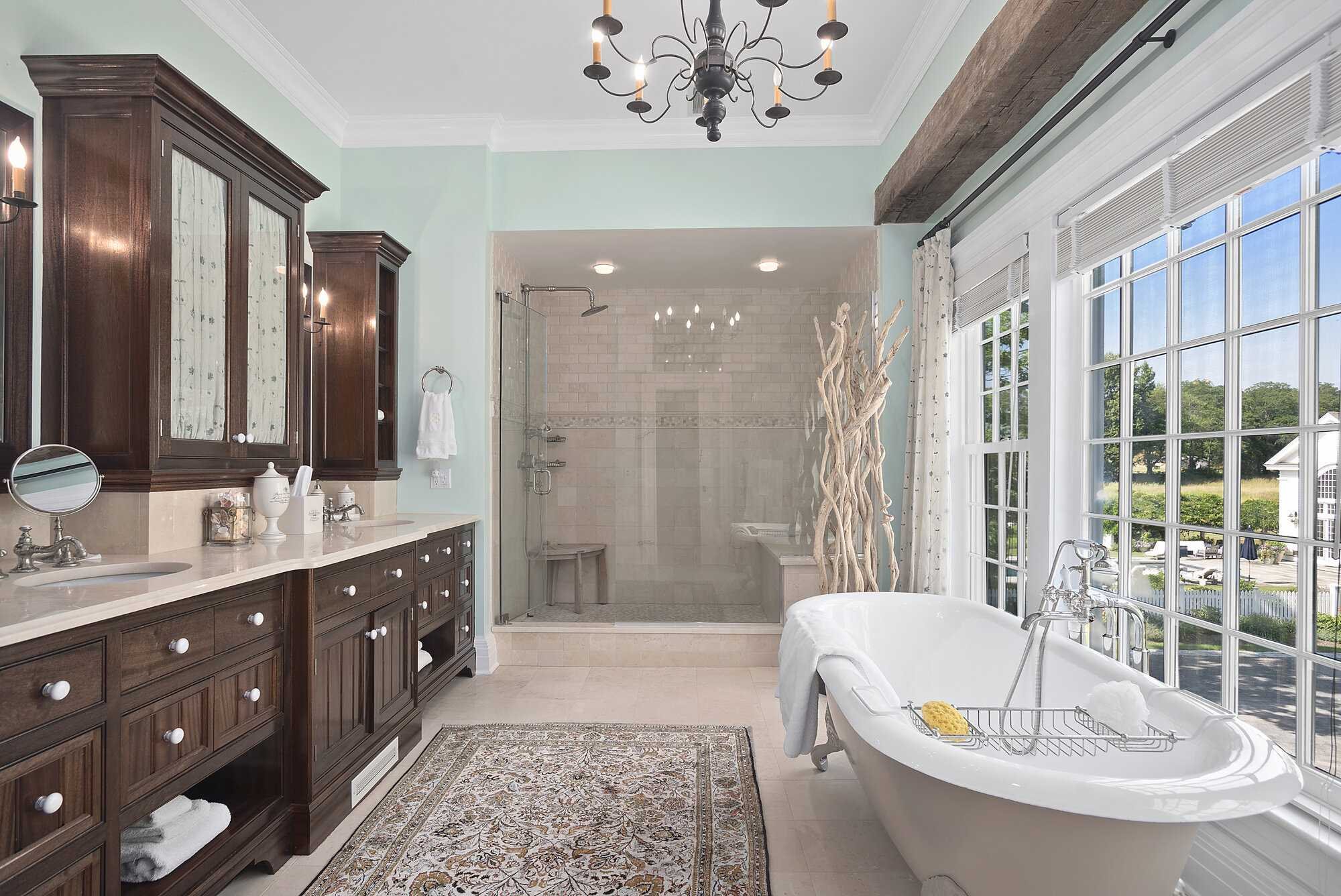 140 Sunset Trail Clinton, NY 12514 - Photo 19 of 30 a spacious bathroom with a bathtub shower sink and mirror