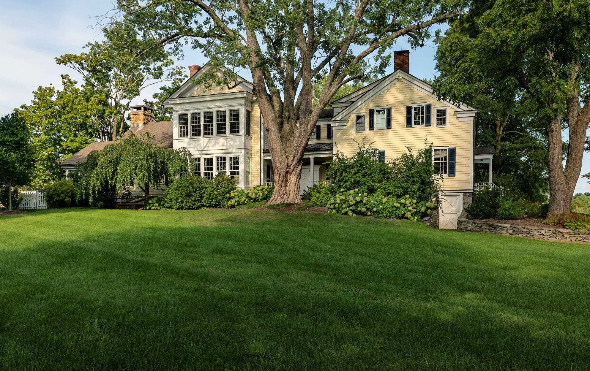 140 Sunset Trail Clinton, NY 12514 - Photo 3 of 30 a front view of a house with a yard and trees