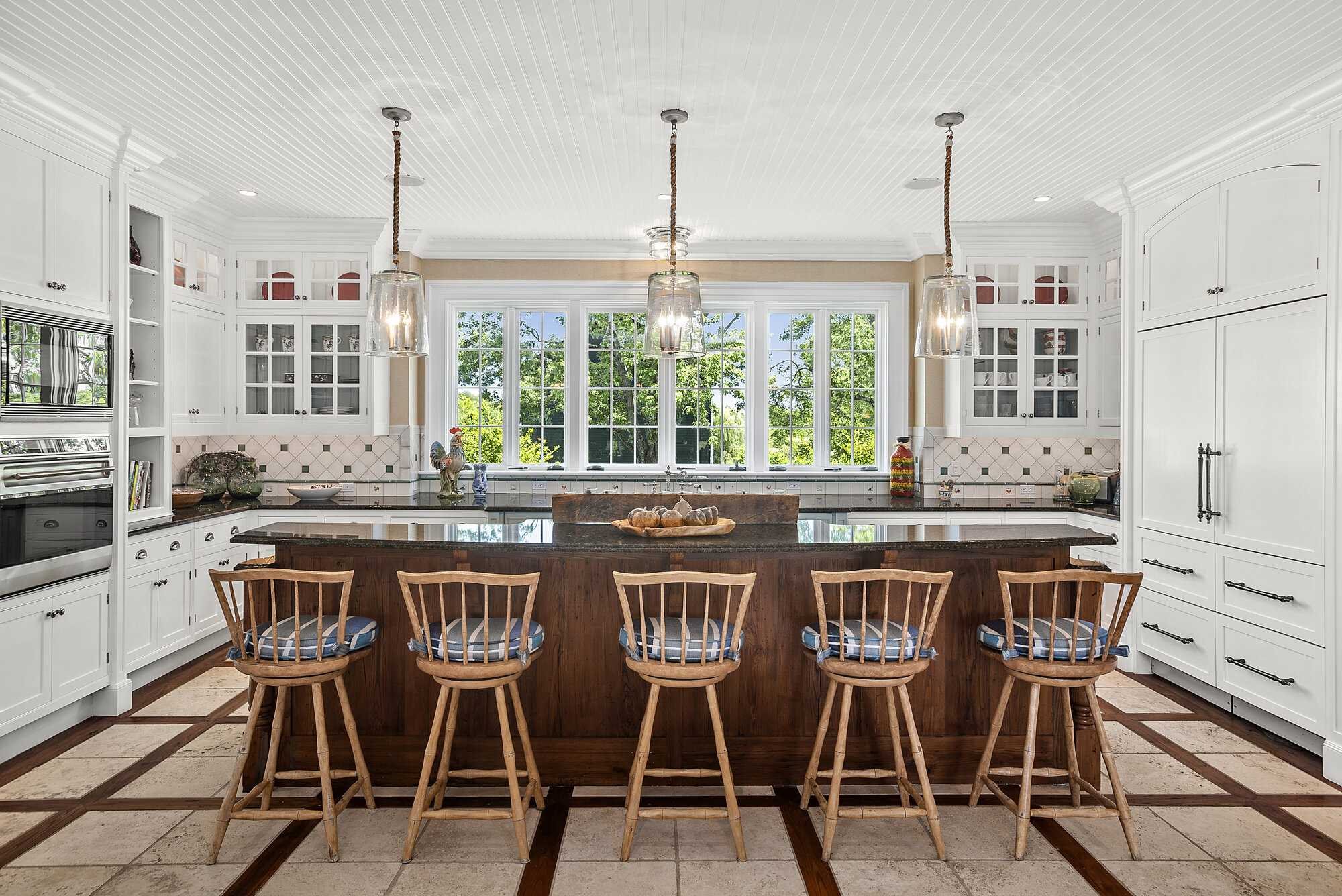 140 Sunset Trail Clinton, NY 12514 - Photo 10 of 30 a dining table with chairs and kitchen view
