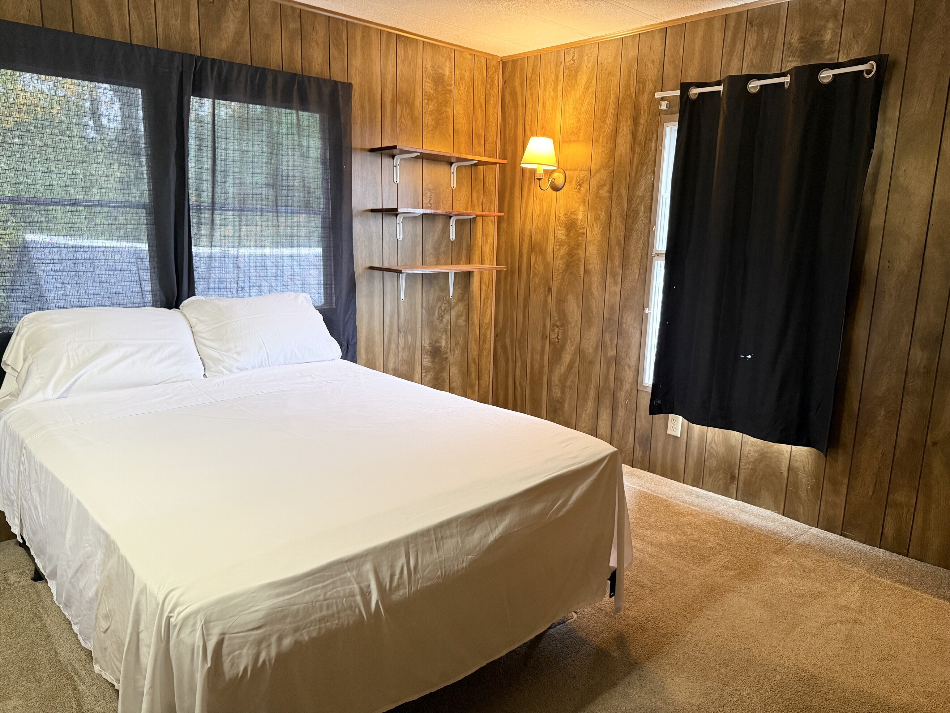 23 Thunderbird Drive Naugatuck, CT 06770 - Photo 19 of 19 a bed sitting in a bedroom next to a window