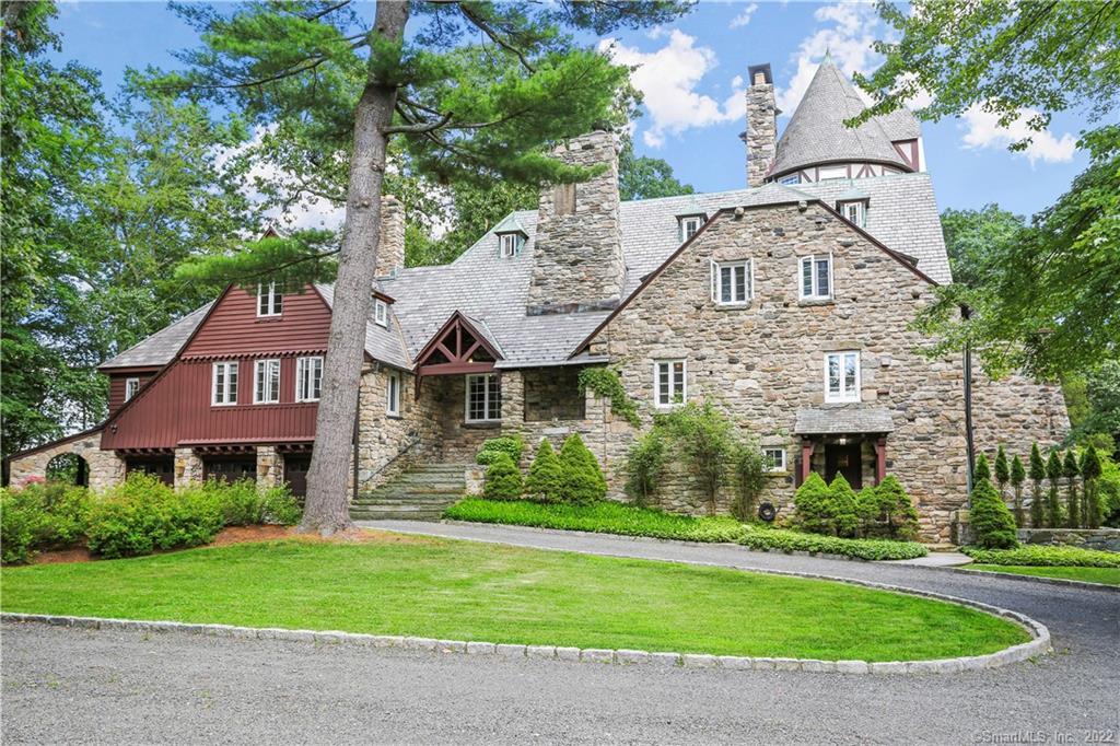 front view of a house with a garden