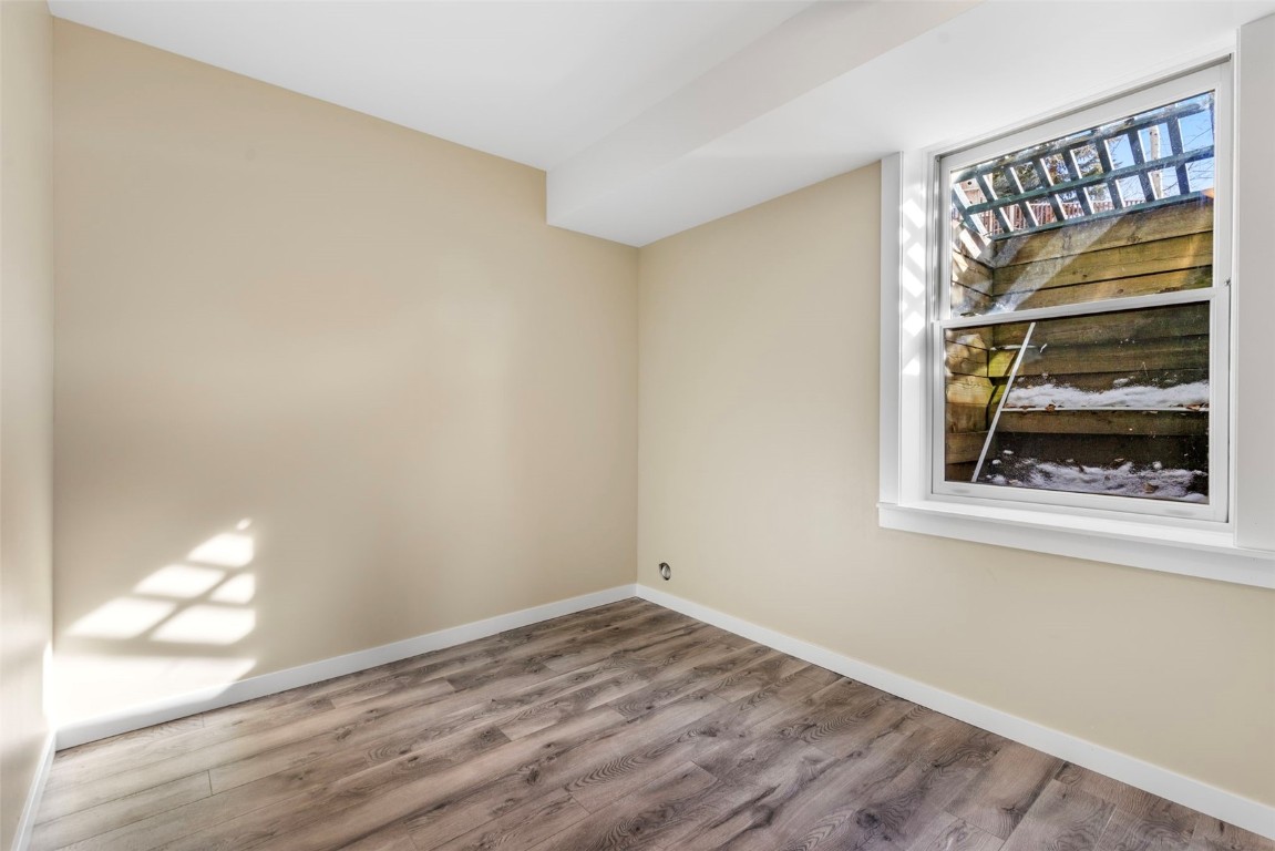 192 Wellington Road Breckenridge, CO 80424 - Photo 43 of 50 Empty room with wood finished floors and baseboards