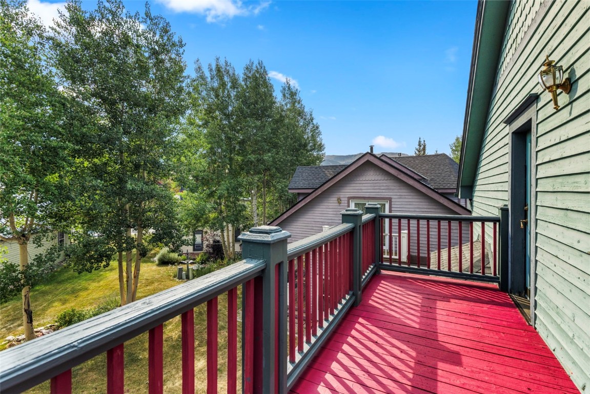 192 Wellington Road Breckenridge, CO 80424 - Photo 46 of 50 Wooden terrace featuring a lawn